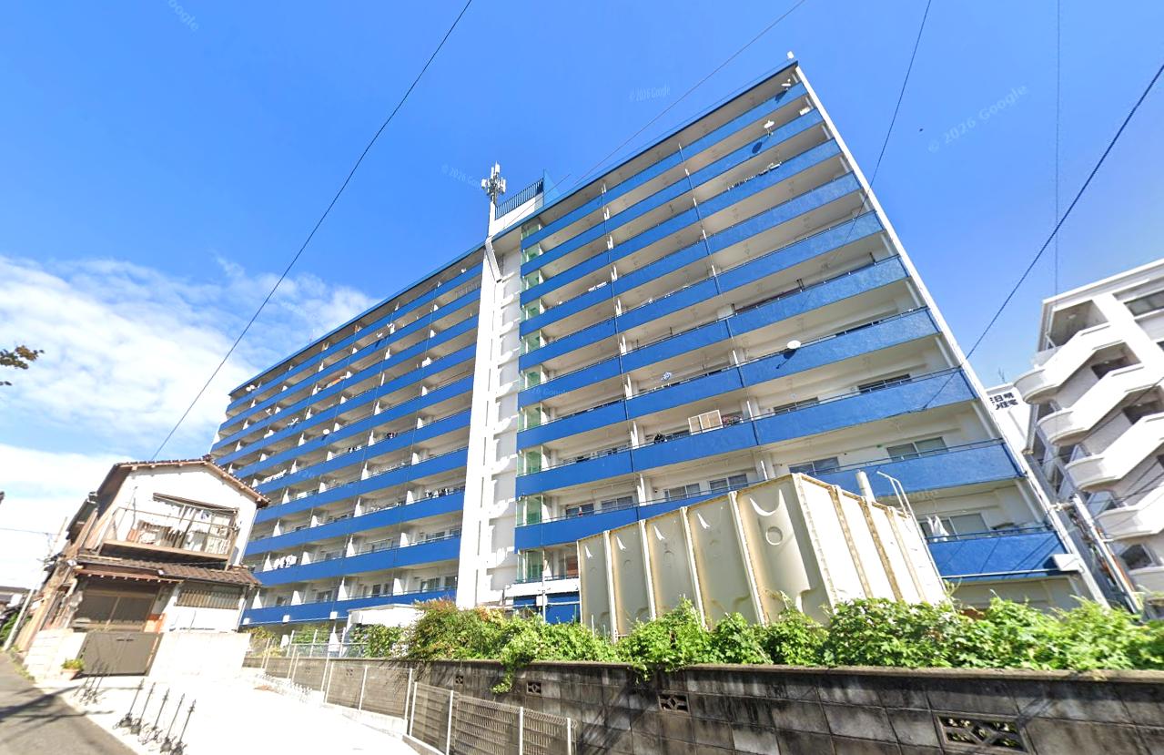 日明コータース